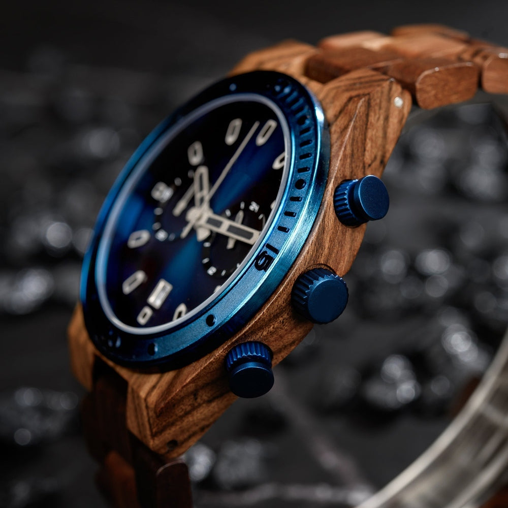 Close-up of Mokozai wooden chronograph watch, featuring a sleek blue bezel and pushers set against a natural wood frame. Ideal for style-conscious individuals in Australia who appreciate luxury craftsmanship and eco-friendly design.