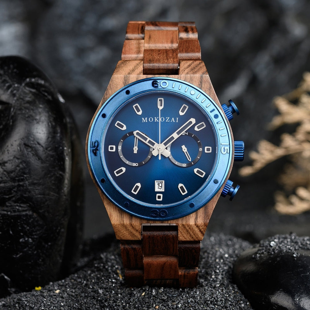 Mokozai wooden watch with a vibrant blue dial and bezel, paired with a rich natural wood band. This luxury eco-friendly timepiece combines modern chronograph functionality with handcrafted wooden design, ideal for stylish Australians seeking sustainable fashion accessories.